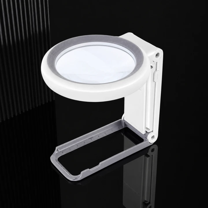Lupa LED ustawiona na stabilnej podstawce